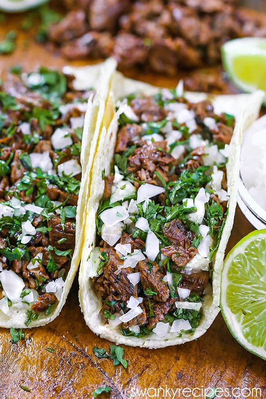 Halal grass-fed skirt steak carne asada tacos sliced against the grain